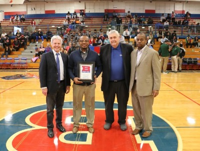 photo of Harold Byrd and Bruce Smith with others at a Bartlett High School basketball game