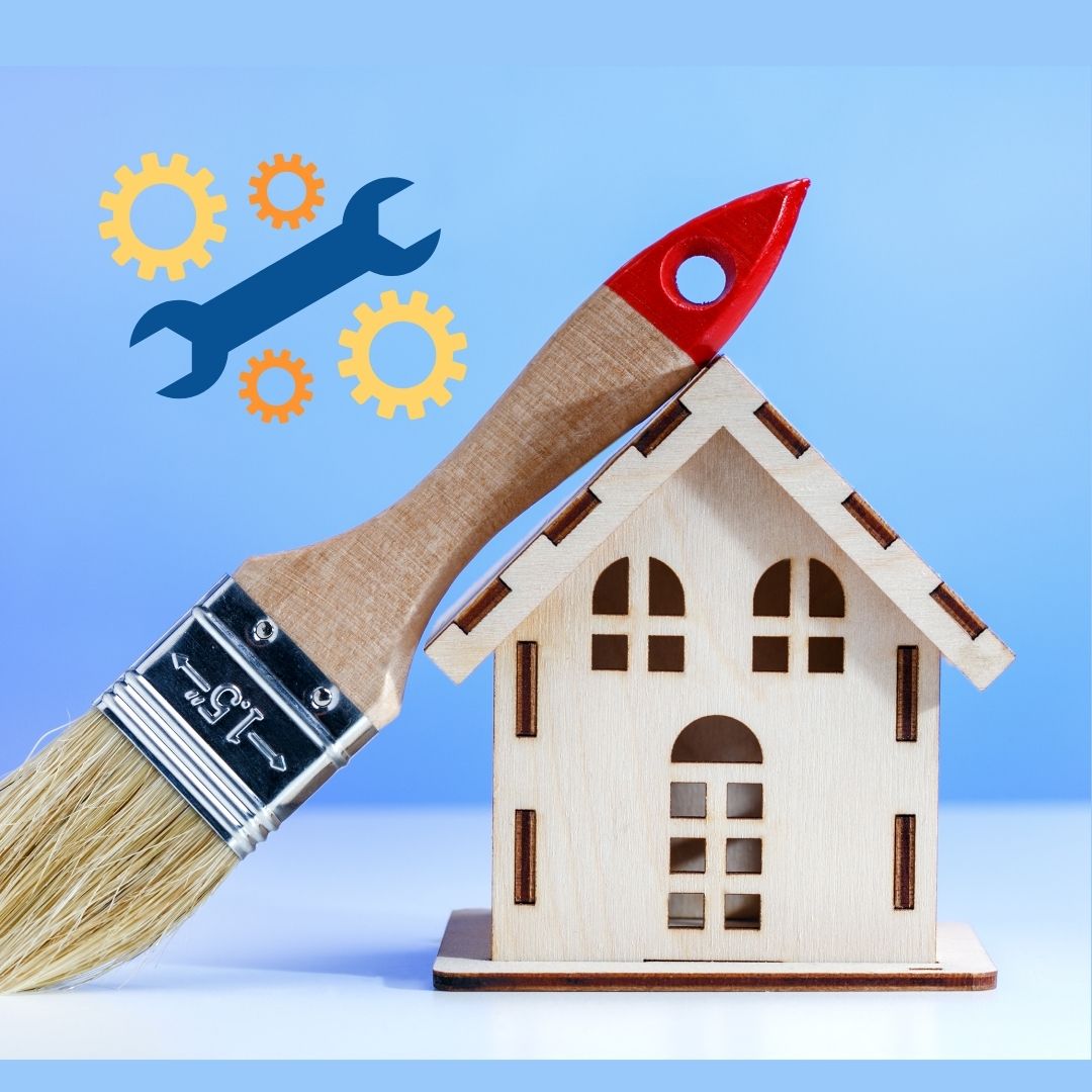 A picture of a small toy wooden house with a paintbrush next to it, leaning on the roof of the house. It is in front of a bright blue background. There are floating icons of tools like gears and a wrench in the image.