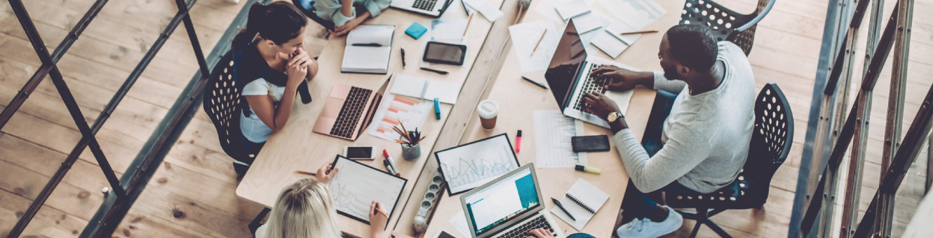 Top-down view of business workers in an office